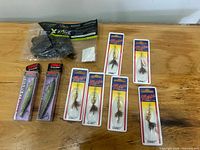 Group shot of all lures – Rapala, Mepps, X Zone