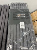 Packaged Gorilla Grip sofa support board showing brand label and folded sections