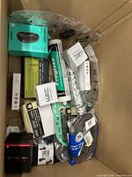 Top view showing all boxed and packaged items inside carton