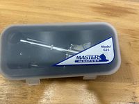 Closed case showing Master Airbrush Model G25 label