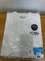 Front of sealed O’Neill shirt package