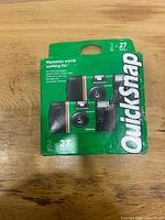 Front of Fujifilm QuickSnap 2-pack box showing two cameras and 27-exposure count