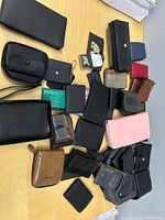 Top view of all wallets spread on table