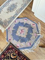 Runner and octagon rug overview showing patterns and overall condition