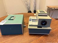 Projector with carrying case side by side