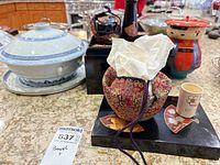 Overall lot showing tureen, lacquer tray with jars, doll container, pouch, cup
