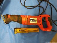 Full view of FireStorm reciprocating saw and DeWalt blade case