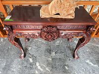 Top and front view of entire console table showing overall design and finish