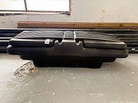 Full view of closed Contico truck bed box from front