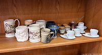 Shelf overview showing all mixed drinkware and copper pieces