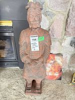 Full front view of terracotta warrior on base