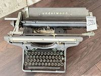 Front top view showing keyboard, platen, carriage