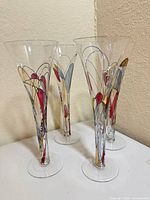 Set of four Paul Nagel hand painted champagne flutes