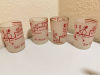 All four frosted shot glasses side-by-side