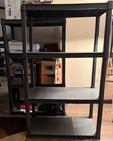 Front view of one Sterilite 4-shelf rack showing overall structure