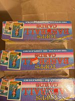 Three sealed Topps Baseball Cards boxes top view showing logos and Jose Canseco photo
