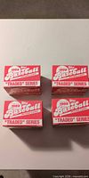 Four 1989 Topps Traded Series boxes, lids closed