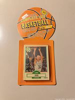 Front view of sealed 1990 Fleer Boston Celtics team set with Larry Bird card