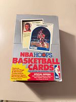 Top of 1990 NBA Hoops wax box with sample card images