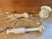 Hand blender, chopper cup and electric knife handles with cords