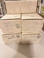 Four labeled storage boxes noting NBA Hoops 91-92 set and other contents
