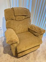 Front view of tan La-Z-Boy fabric recliner
