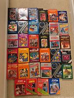 Overview of roughly 35 boxed fronts laid out on floor