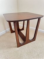 Full view of end table showing top, legs and finish