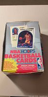 Top view of NBA Hoops retail box with player cards graphic