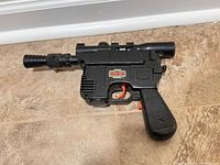 Right side view of vintage Star Wars ESB toy blaster