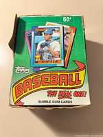 Top view of Topps Baseball retail box with card image, shows wear