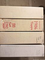 Top view of four long boxes showing label 1986 Topps and BB Set (792)