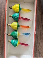 Five bubble light bulbs in cardboard holder