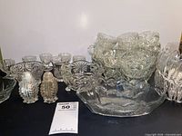 Group shot of all clear pressed glass pieces