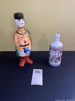 Both ceramic items side by side on table