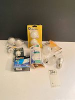 Group shot of all packaged and loose bulbs on table