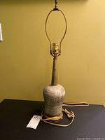 Full view of lamp with harp, finial and cord