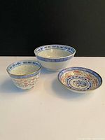 Group view of tea cup, saucer and bowl showing size and patterns