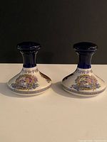 Front view of both cobalt blue porcelain decanters