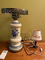 Both lamps side by side on table