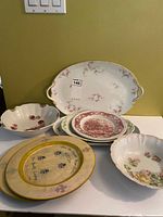 Group shot showing all plates, bowls and chargers