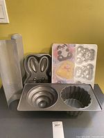 All four Wilton pans grouped together showing variety of shapes and sizes