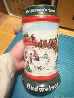 Front view showing "The Season's Best" text and Budweiser logo base