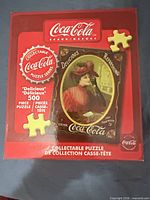 Front of sealed Coca-Cola 500-piece puzzle box