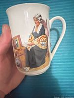 Front view of mug showing Rockwell-inspired illustration