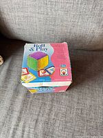 Front angled view of boxed Roll & Play game