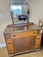 Front view of dresser with attached mirror
