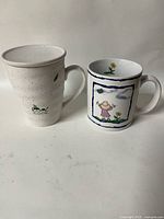 Front view of both mugs side by side