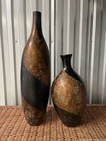 Both matching vases showing relative sizes and full pattern