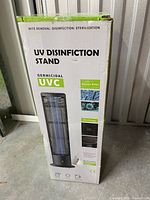 Full view of product box showing UV disinfection stand graphics and specifications